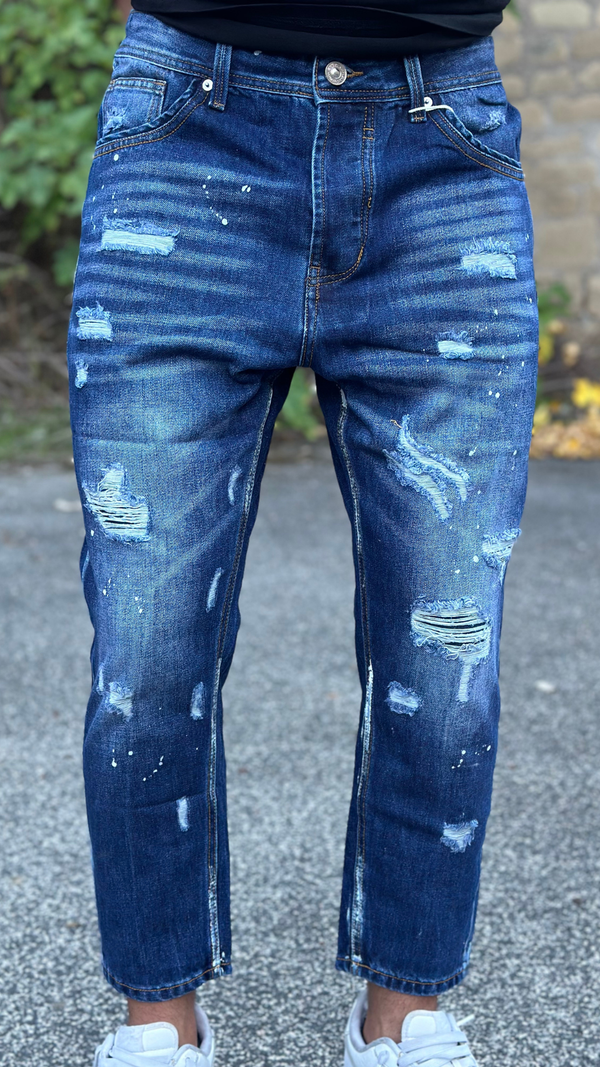 Dark blue jeans with rips